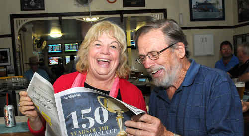 Melbourne Cup winner Wendy Green checks the form at the Australian Hotel with punter Don Davidson yesterday. Melbourne Cup winner Wendy Green checks the form at the Australian Hotel with punter Don Davidson yesterday.